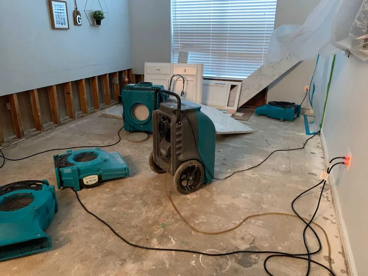 Dehumidifier in flood-cut room for Water Damage Restoration in Wellesley